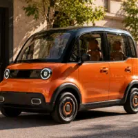 Petit quadricycle électrique orange néo-rétro 4 places en ville